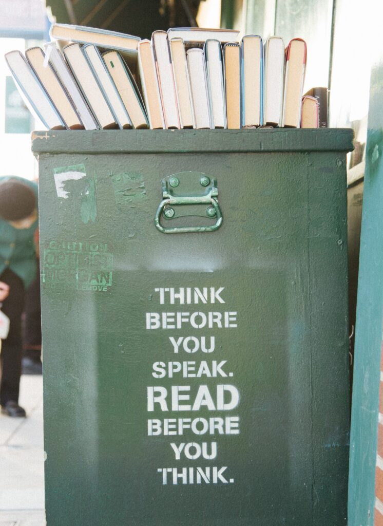 Book bin that says: Think before you speak. Read before you think.